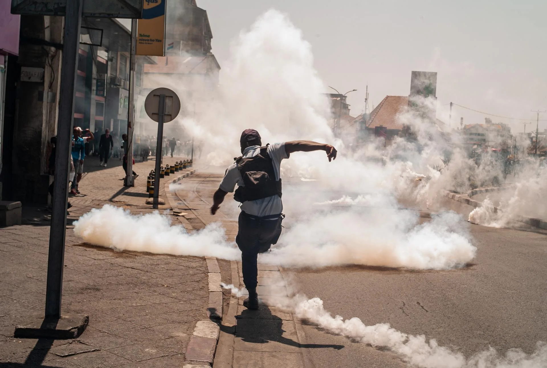 A protester kicks away a tear gas canister during a rally in Antananarivo, Madagascar. September 25, 2025. EFE/EPA/HENITSOA RAFALIA