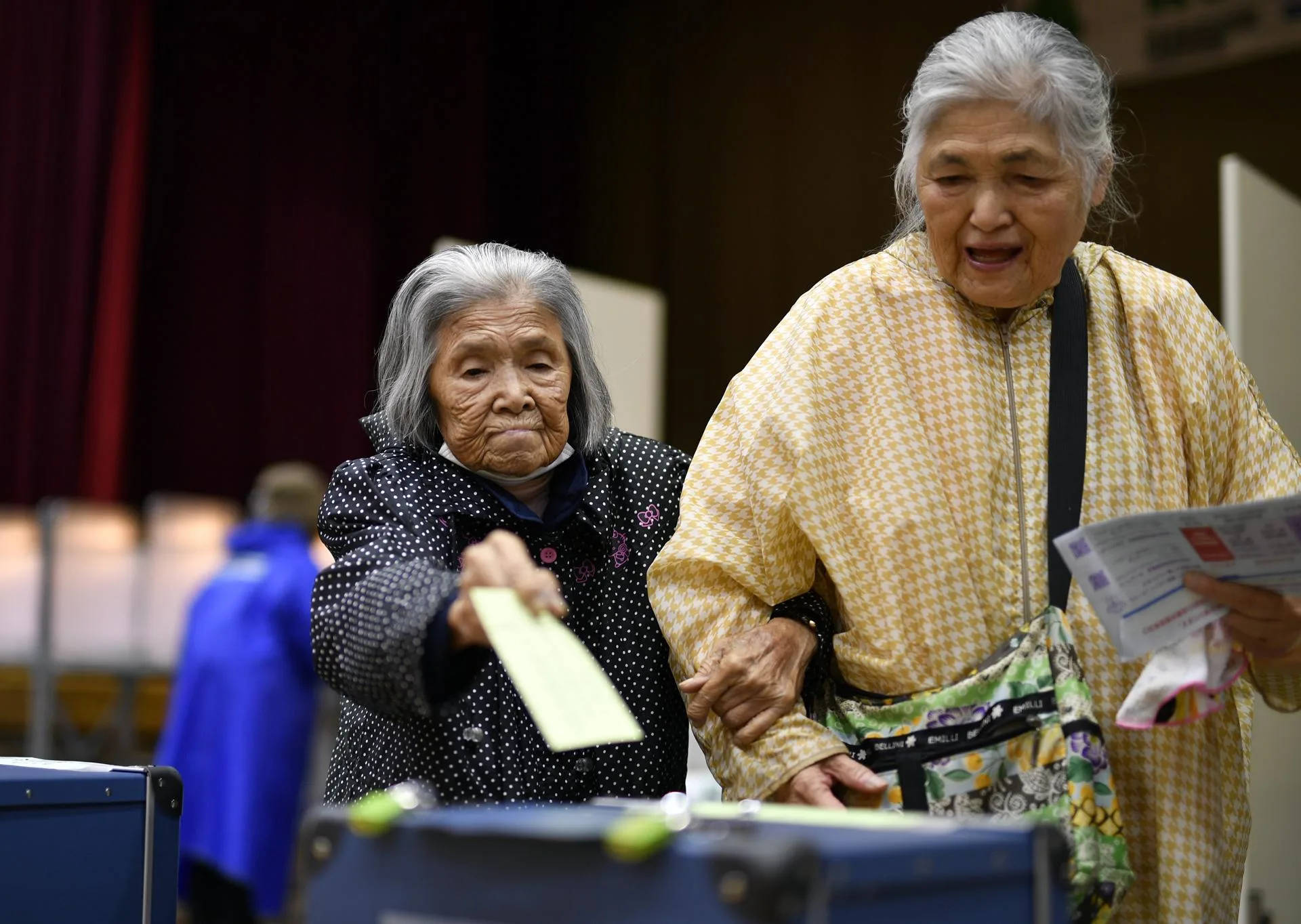 (FILE) Elderly women cast their votes for the lower house election at a polling station in Tokyo, Japan. EFE/EPA/FRANCK ROBICHON
