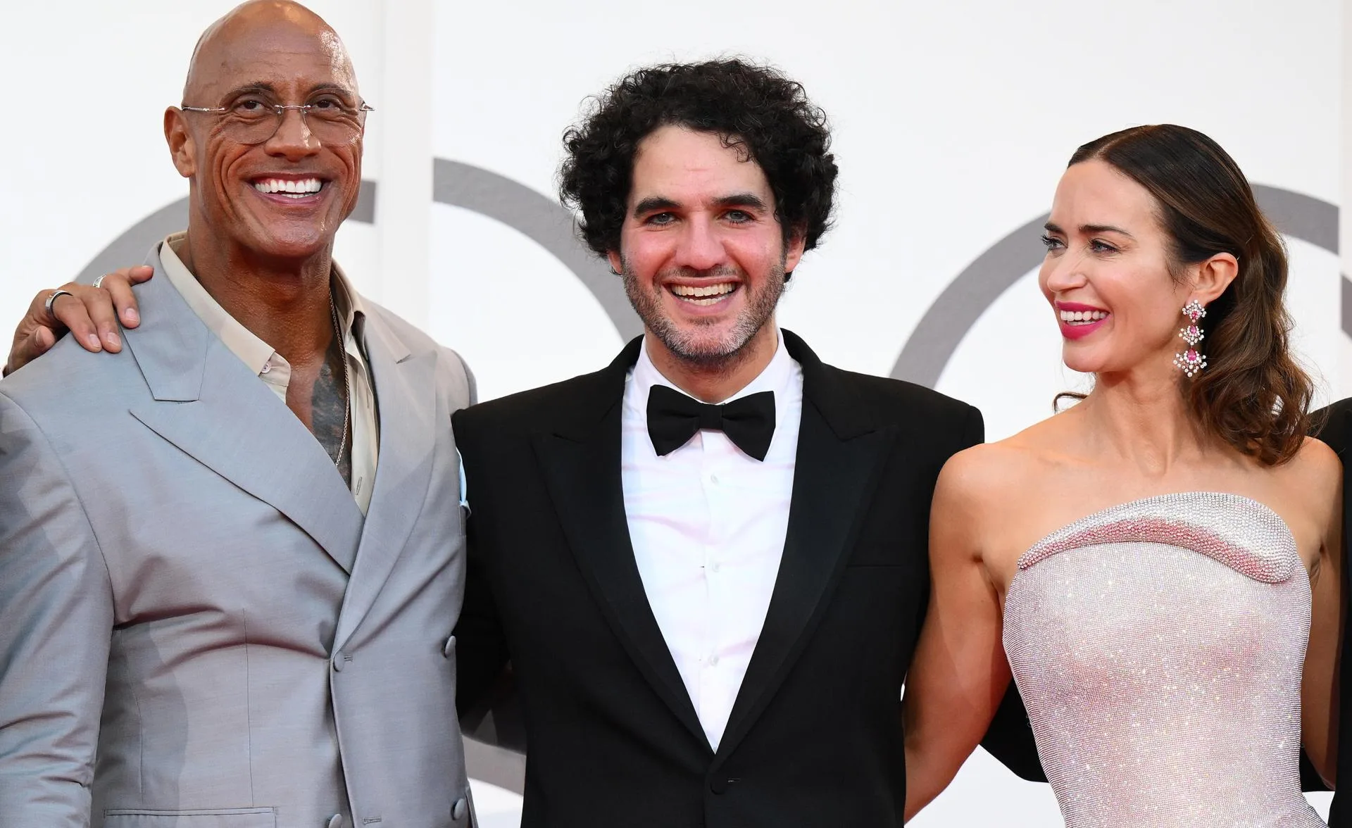 US actor Dwayne Johnson (L), US director Benny Safdie (C), and British actor Emily Blunt arrive for the premiere of 'The Smashing Machine' during the 82nd annual Venice International Film Festival, in Venice, Italy, Sep. 1, 2025. EFE/EPA/ETTORE FERRARI
